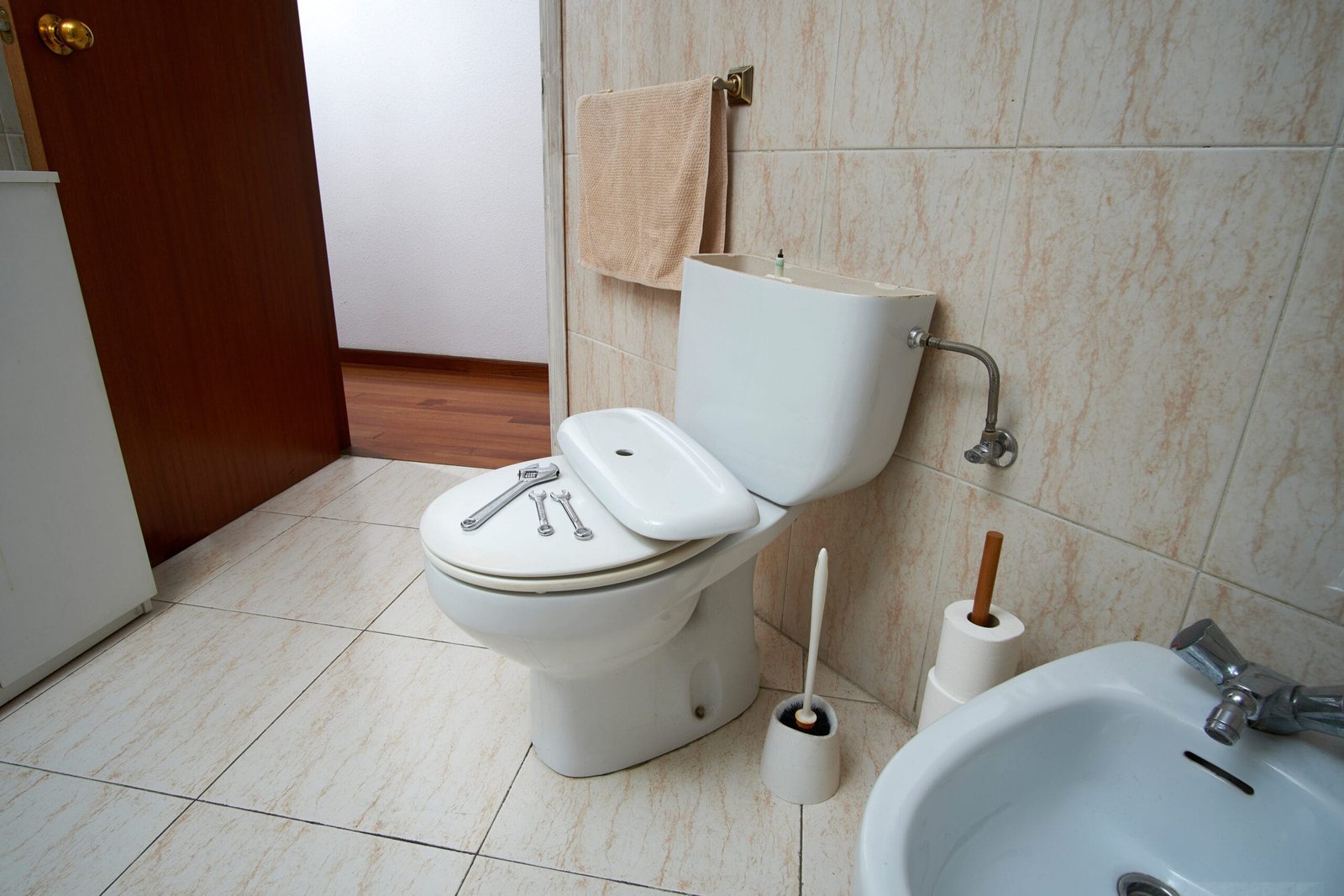 A close-up image of a malfunctioning toilet with water still in the bowl, illustrating a common issue where it won't flush properly.